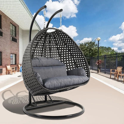 LeisureMod Sedia a Uovo Sospesa per 2 Persone con Supporto - Dondolo Pensile per Esterni/Interni in Rattan Intrecciato con Cuscini