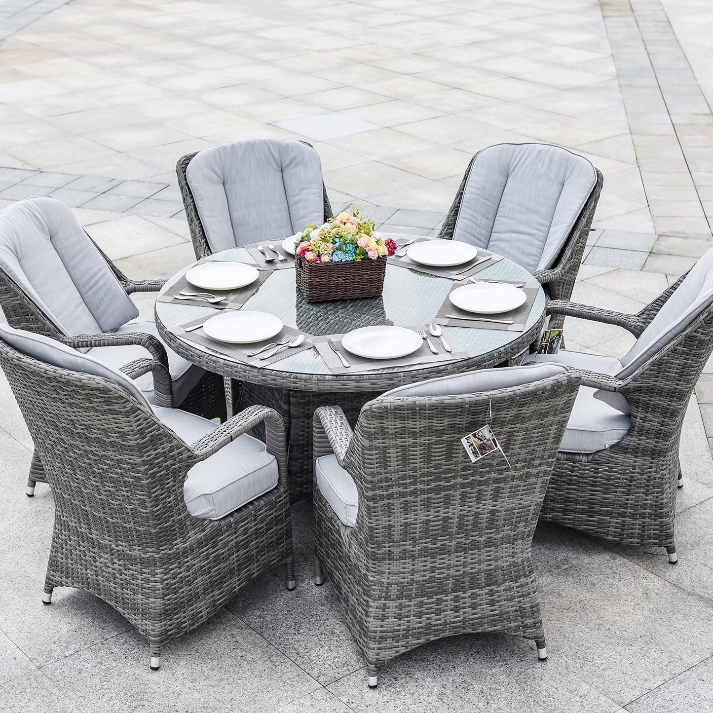 Set da pranzo rotondo da esterno in 7 pezzi in vimini di rattan con cuscini di Moda Furnishings