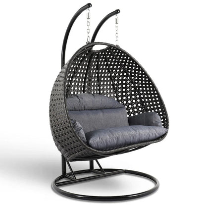 LeisureMod Sedia a Uovo Sospesa per 2 Persone con Supporto - Dondolo Pensile per Esterni/Interni in Rattan Intrecciato con Cuscini