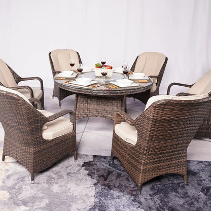Set da pranzo rotondo da esterno in 7 pezzi in vimini di rattan con cuscini di Moda Furnishings