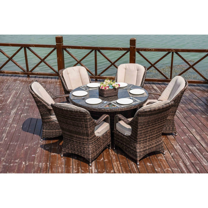 Set da pranzo rotondo da esterno in 7 pezzi in vimini di rattan con cuscini di Moda Furnishings